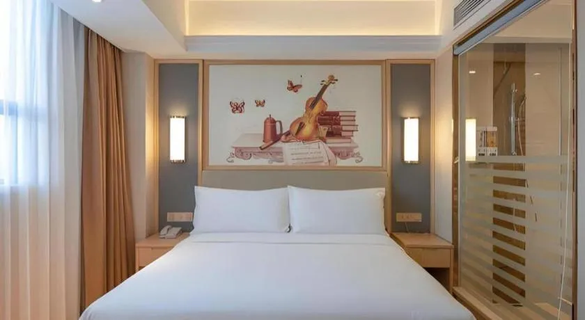 Bed in Vienna Hotel Guangdong Dongguan East Station