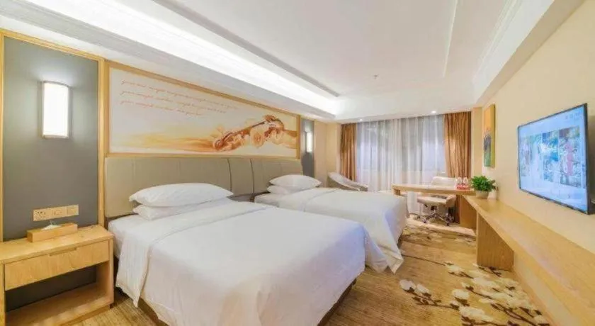 Bed in Vienna Hotel Guangdong Dongguan East Station