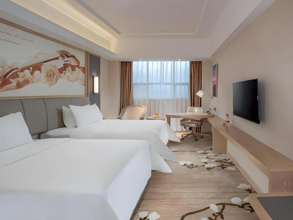 Bed in Vienna Hotel Guangdong Dongguan East Station