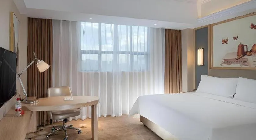 Bed in Vienna Hotel Guangdong Dongguan East Station