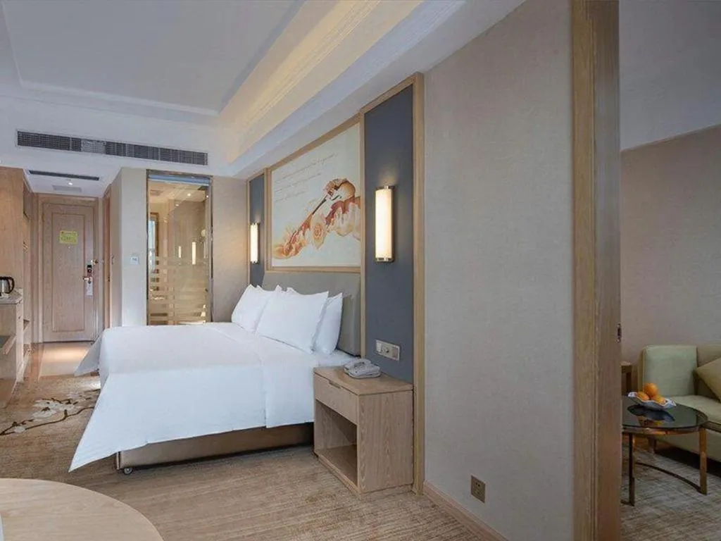 Bed in Vienna Hotel Guangdong Dongguan East Station