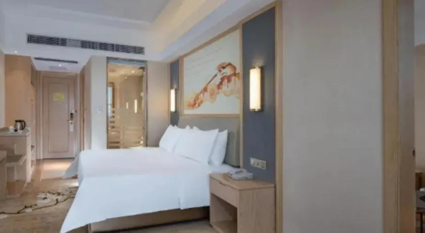 Bed in Vienna Hotel Guangdong Dongguan East Station