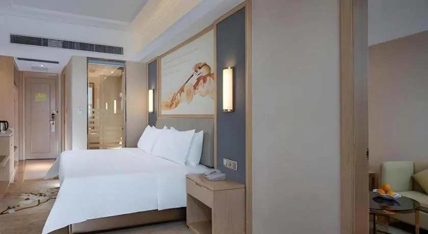 Bed in Vienna Hotel Guangdong Dongguan East Station