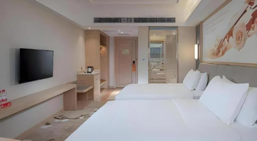 Bed in Vienna Hotel Guangdong Dongguan East Station