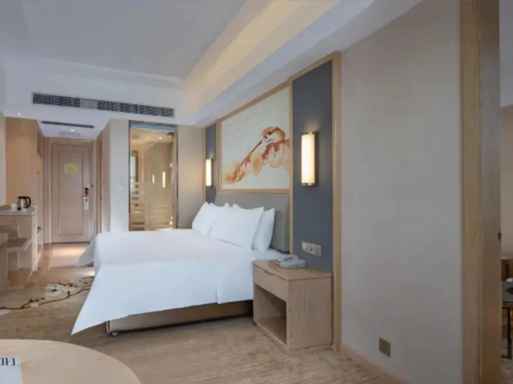 Bed in Vienna Hotel Guangdong Dongguan East Station