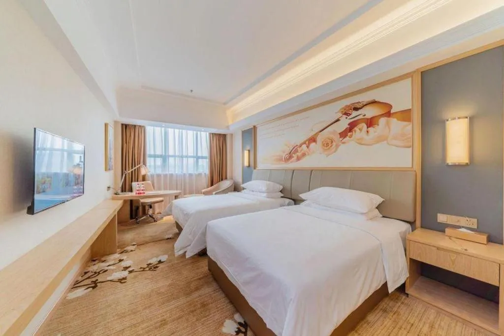 Bed in Vienna Hotel Guangdong Dongguan East Station