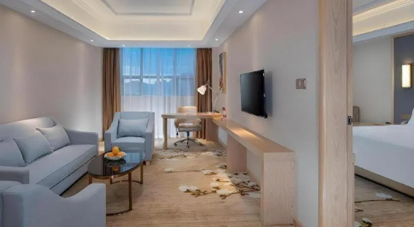 Bed in Vienna Hotel Guangdong Dongguan East Station