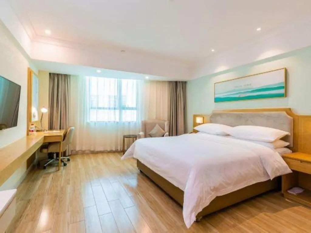 Bed in Vienna Hotel Guangdong Foshan Shunde Longjiang Material City