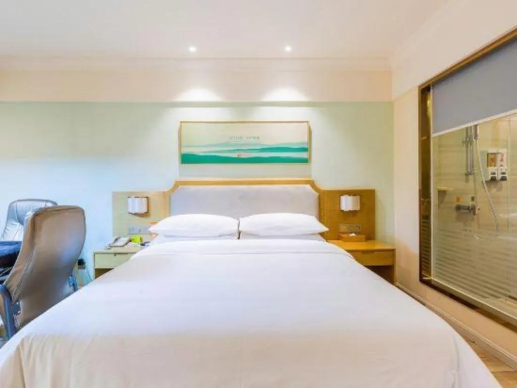 Bed in Vienna Hotel Guangdong Foshan Shunde Longjiang Material City