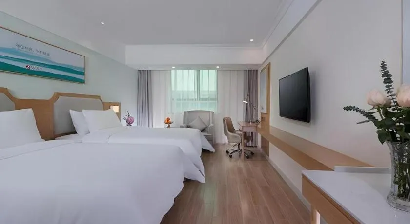 Bed in Vienna Hotel Guangdong Foshan Shunde Longjiang Material City