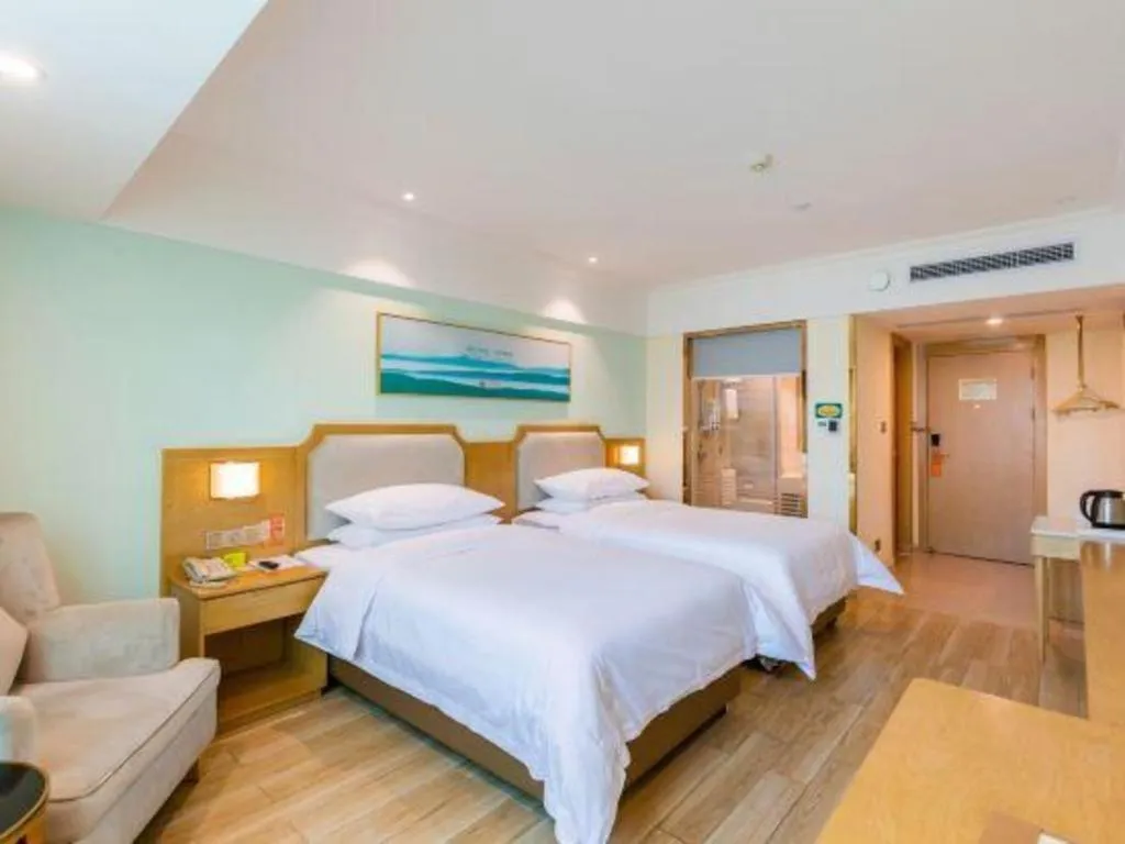 Bed in Vienna Hotel Guangdong Foshan Shunde Longjiang Material City