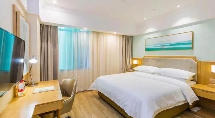 Bed in Vienna Hotel Guangdong Foshan Shunde Longjiang Material City