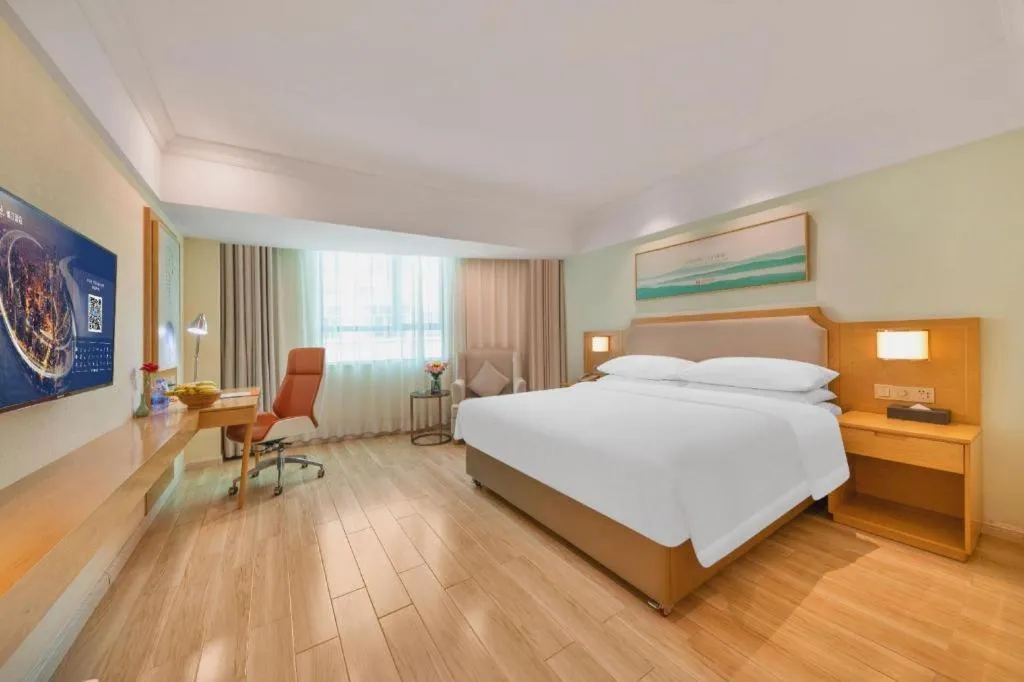 Bed in Vienna Hotel Guangdong Foshan Shunde Longjiang Material City