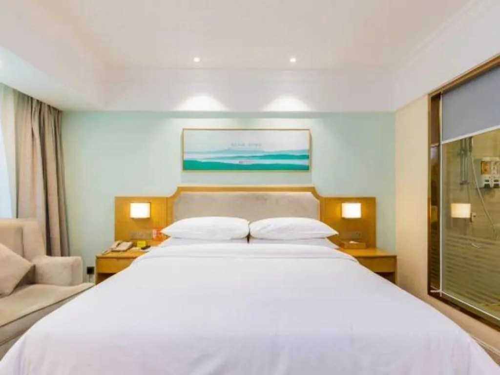 Bed in Vienna Hotel Guangdong Foshan Shunde Longjiang Material City