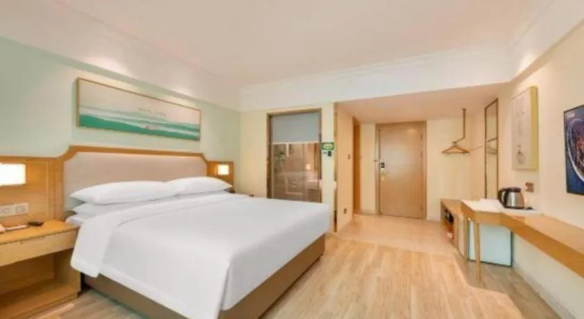 Bed in Vienna Hotel Guangdong Foshan Shunde Longjiang Material City