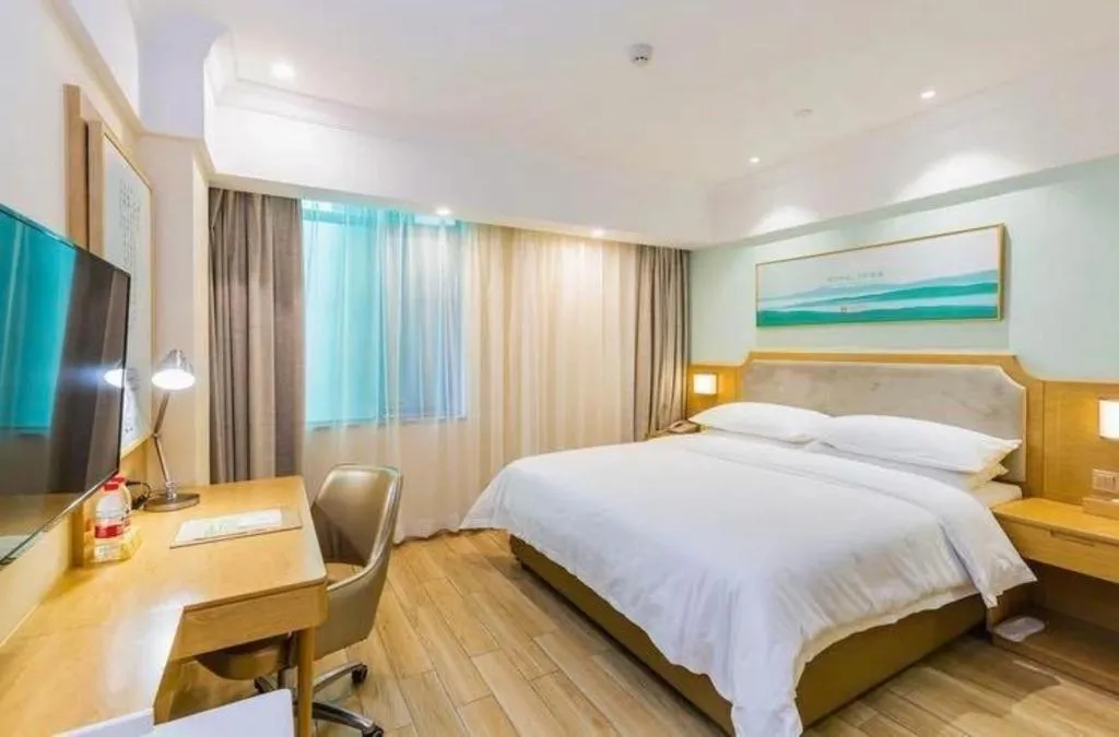 Bed in Vienna Hotel Guangdong Foshan Shunde Longjiang Material City