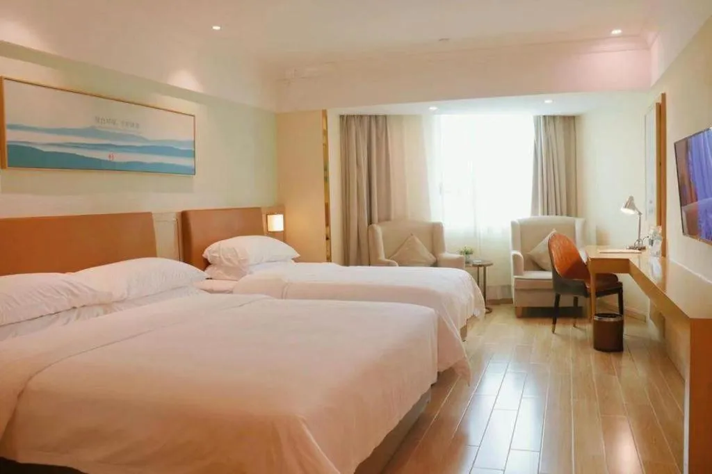 Bed in Vienna Hotel Guangdong Foshan Shunde Longjiang Material City