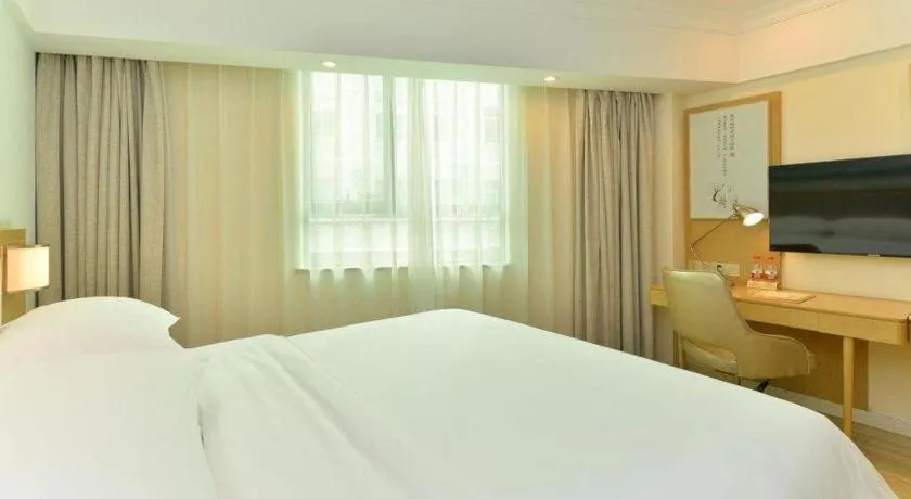 Bed in Vienna Hotel Guangdong Foshan Shunde Longjiang Material City