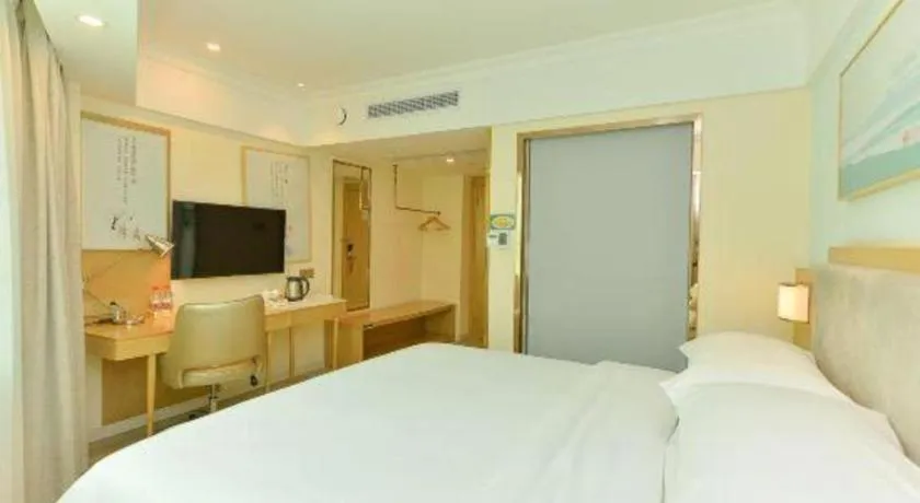Bed in Vienna Hotel Guangdong Foshan Shunde Longjiang Material City