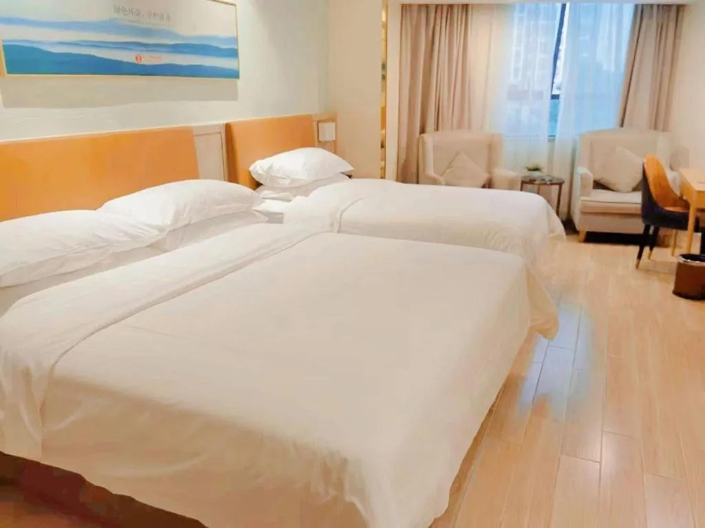 Bed in Vienna Hotel Guangdong Foshan Shunde Longjiang Material City