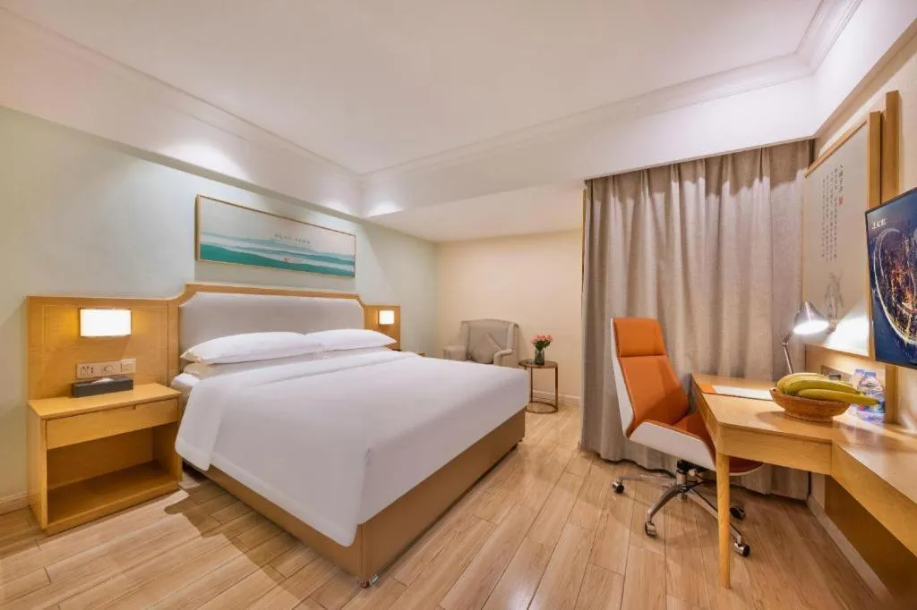 Bed in Vienna Hotel Guangdong Foshan Shunde Longjiang Material City