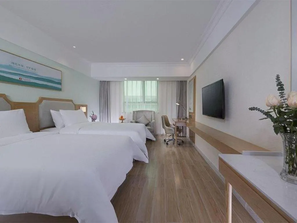 Bed in Vienna Hotel Guangdong Foshan Shunde Longjiang Material City