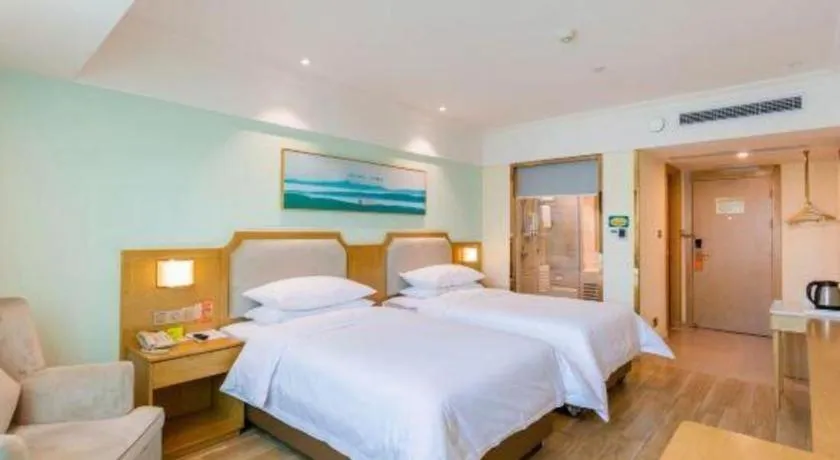 Bed in Vienna Hotel Guangdong Foshan Shunde Longjiang Material City