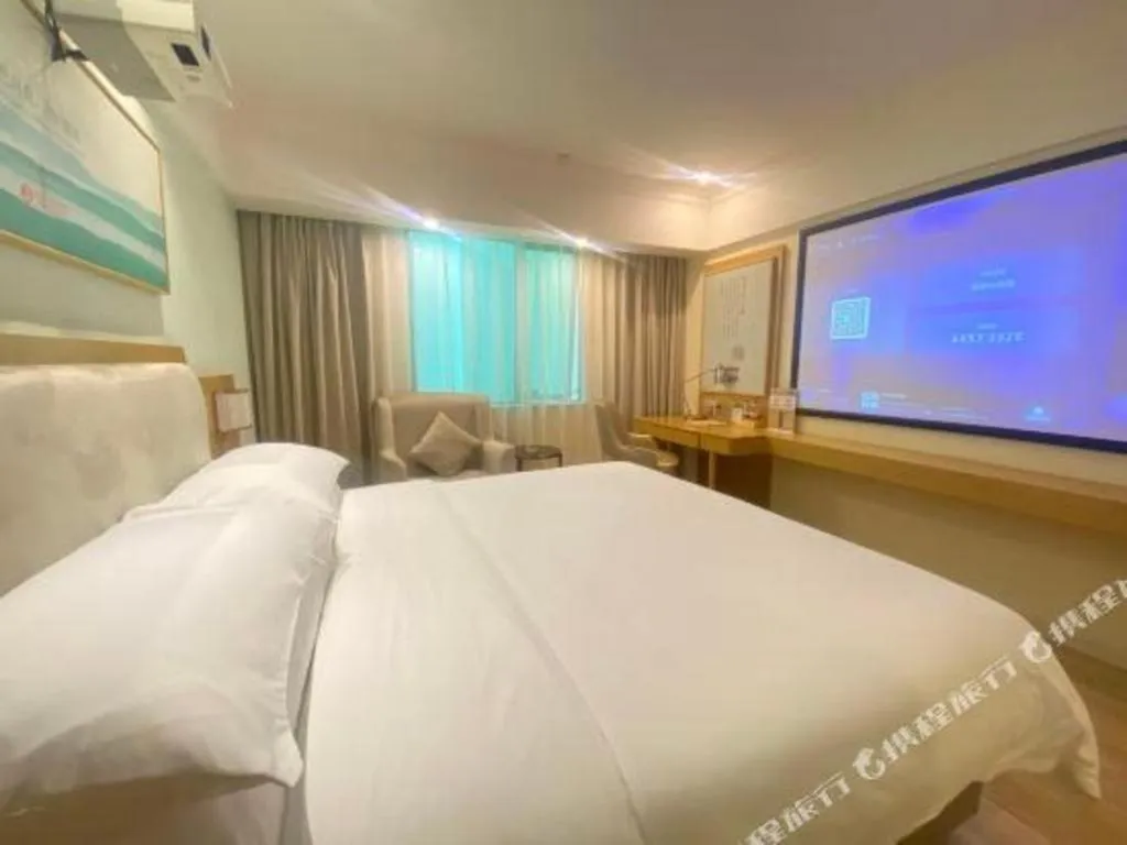 Bed in Vienna Hotel Guangdong Foshan Shunde Longjiang Material City