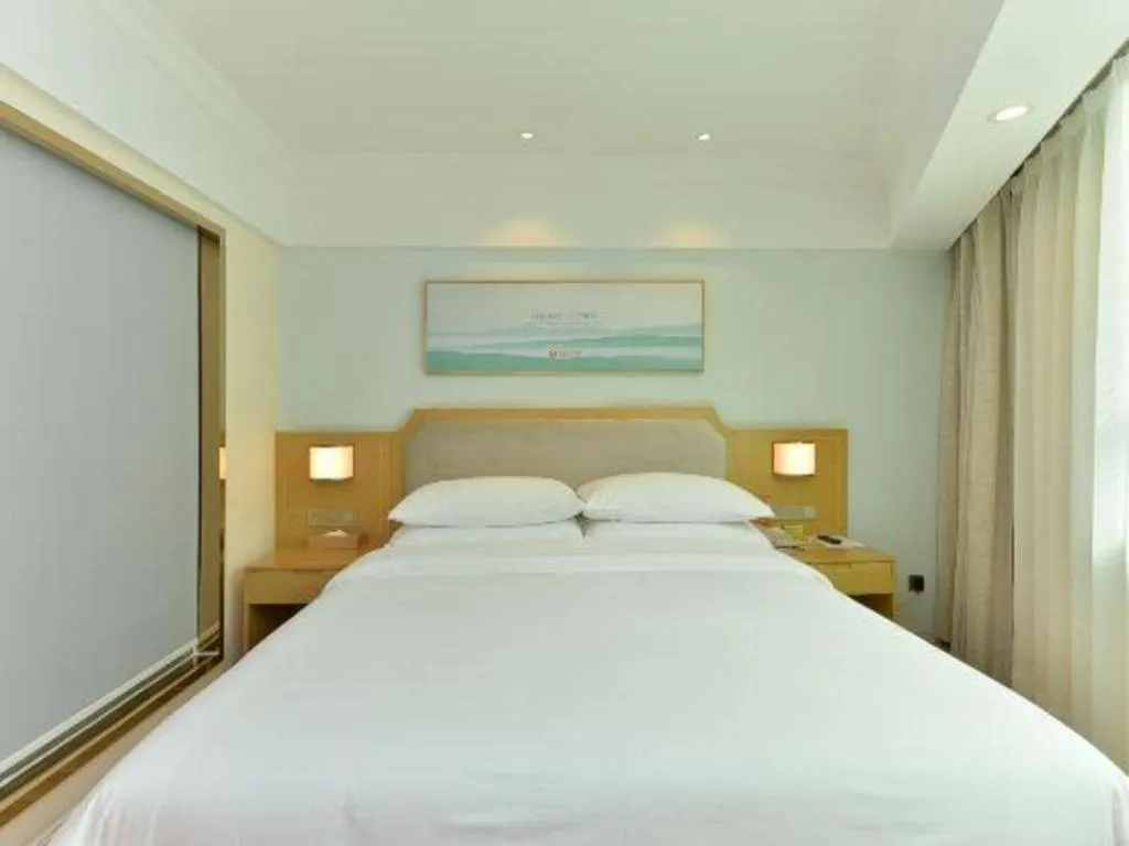 Bed in Vienna Hotel Guangdong Foshan Shunde Longjiang Material City