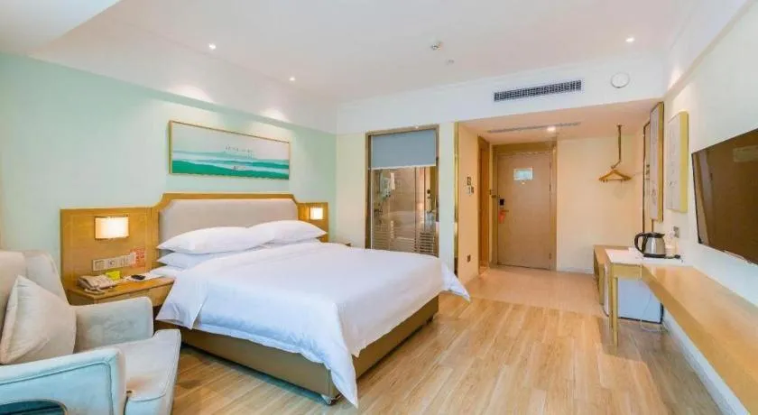 Bed in Vienna Hotel Guangdong Foshan Shunde Longjiang Material City