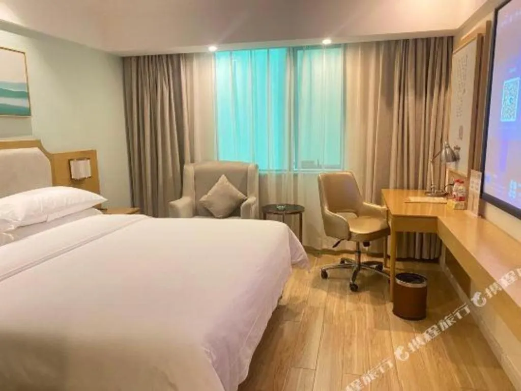 Bed in Vienna Hotel Guangdong Foshan Shunde Longjiang Material City