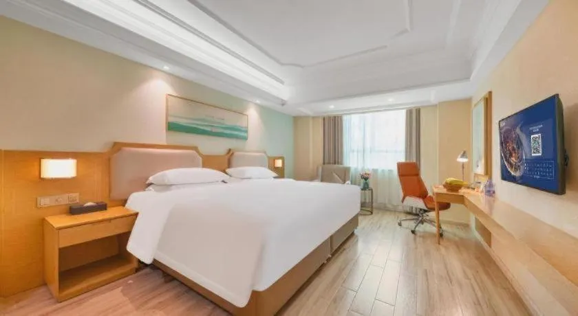 Bed in Vienna Hotel Guangdong Foshan Shunde Longjiang Material City