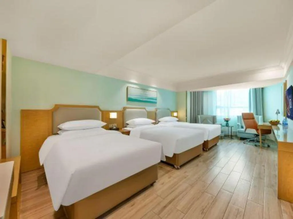 Bed in Vienna Hotel Guangdong Foshan Shunde Longjiang Material City