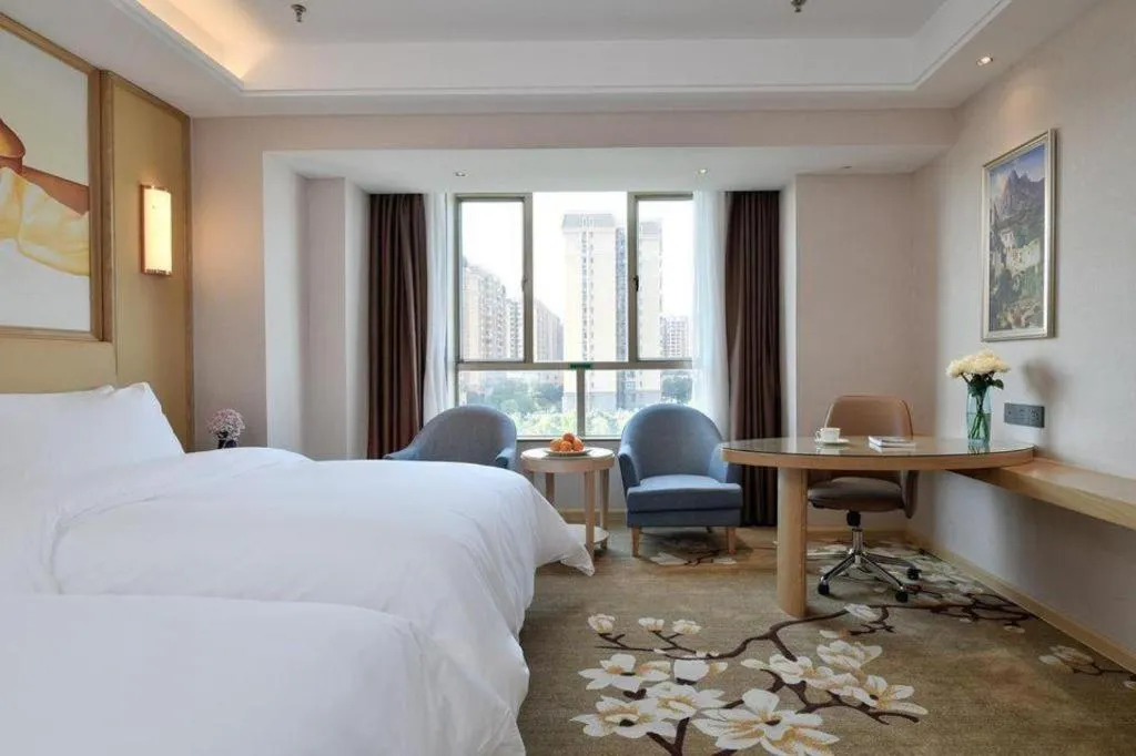 Bed in Vienna Hotel Guangdong Foshan West Station Airport Luocun