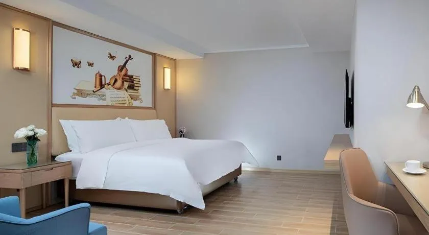 Bed in Vienna Hotel Guangdong Foshan West Station Airport Luocun