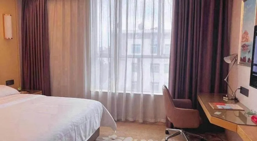 Bed in Vienna Hotel Guangdong Foshan West Station Airport Luocun