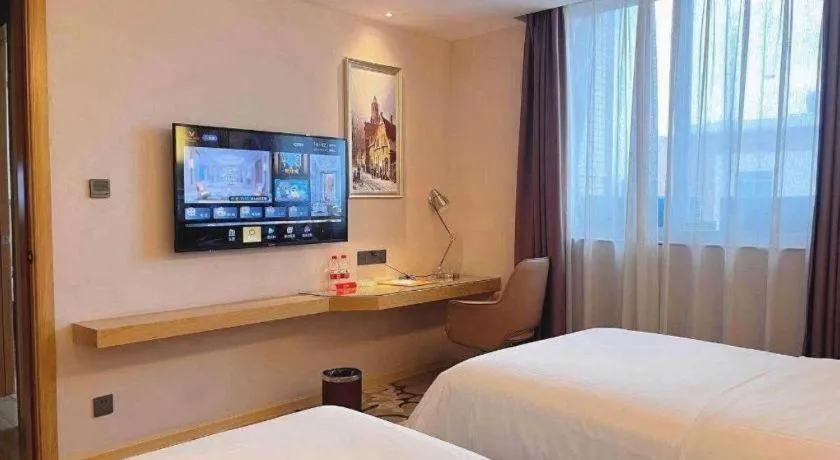 Bed in Vienna Hotel Guangdong Foshan West Station Airport Luocun