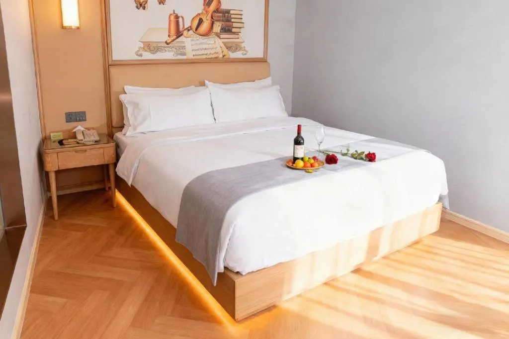 Bed in Vienna Hotel Guangdong Foshan West Station Airport Luocun