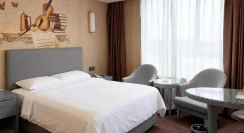 Bed in Vienna Hotel Guangdong Foshan West Station Airport Luocun