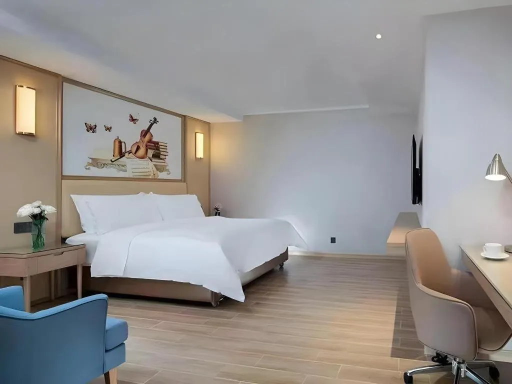 Bed in Vienna Hotel Guangdong Foshan West Station Airport Luocun