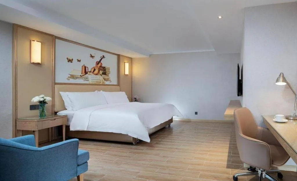 Bed in Vienna Hotel Guangdong Foshan West Station Airport Luocun