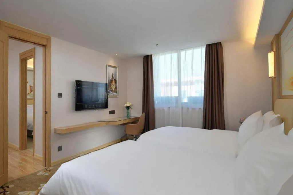 Bed in Vienna Hotel Guangdong Foshan West Station Airport Luocun