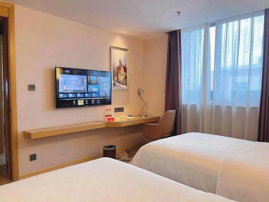 Bed in Vienna Hotel Guangdong Foshan West Station Airport Luocun