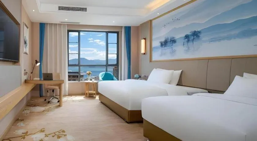 Bed in Vienna Hotel Yunnan Dali Erhai Lake