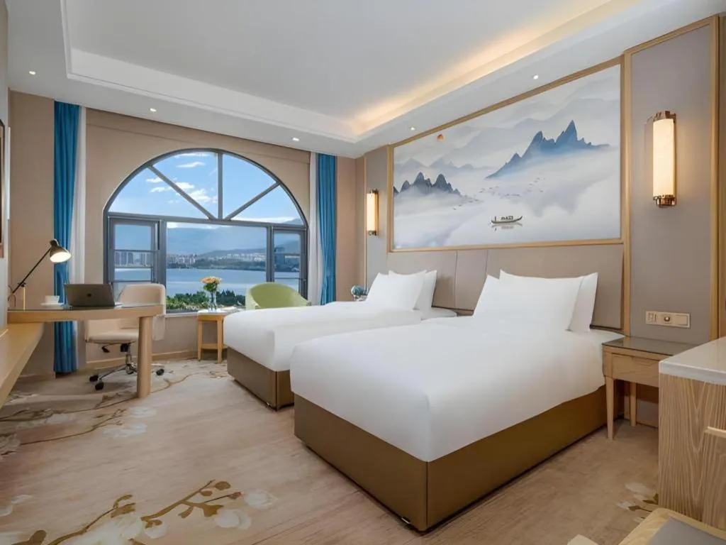 Bed in Vienna Hotel Yunnan Dali Erhai Lake