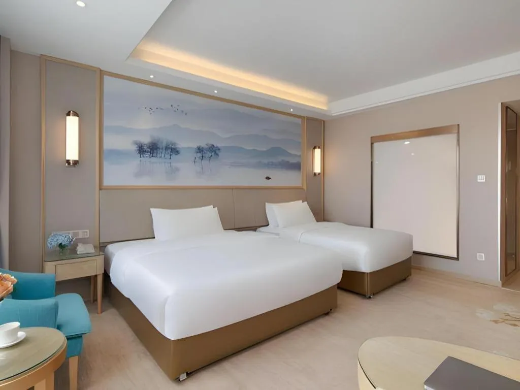 Bed in Vienna Hotel Yunnan Dali Erhai Lake