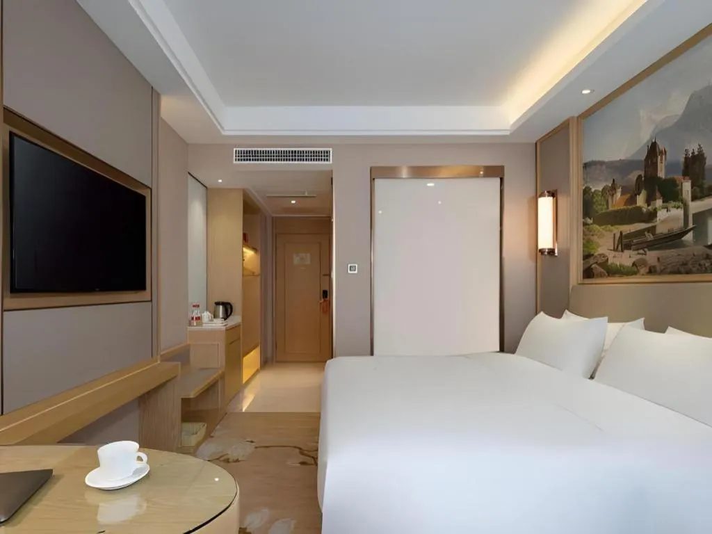 Bed in Vienna Hotel Yunnan Dali Erhai Lake