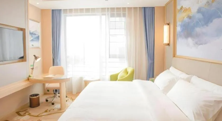 Bed in Vienna Hotel Yunnan Dali Erhai Lake