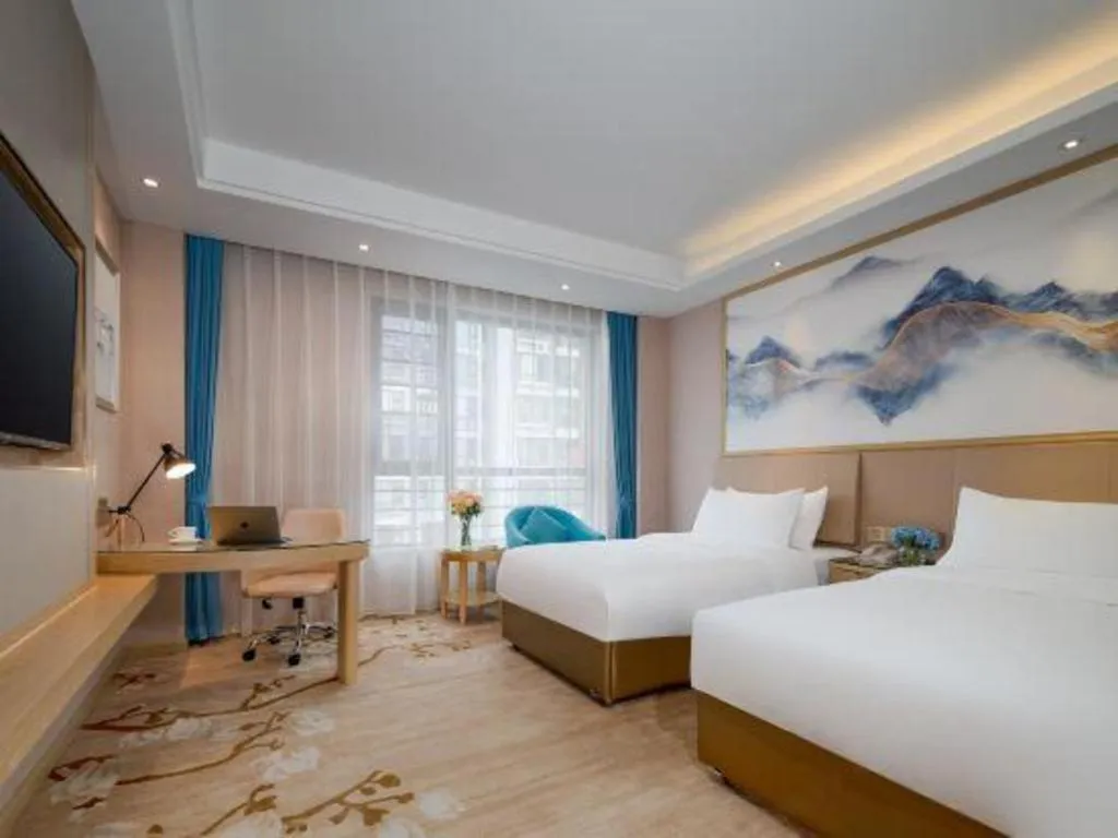 Bed in Vienna Hotel Yunnan Dali Erhai Lake