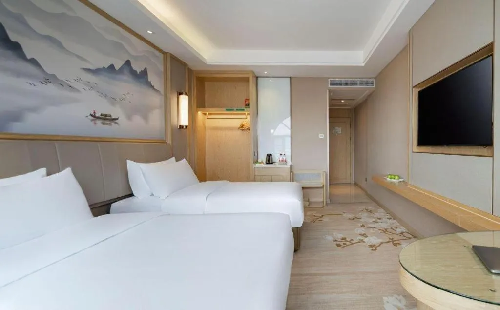 Bed in Vienna Hotel Yunnan Dali Erhai Lake